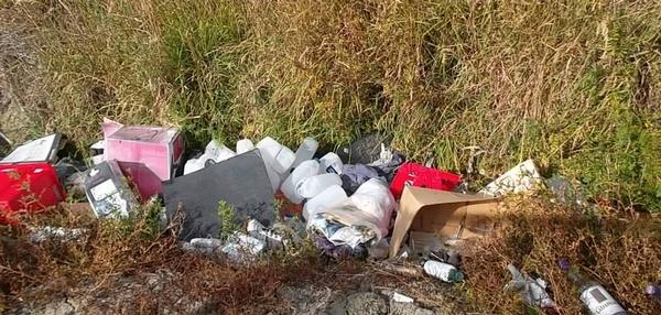 Rubbish (mainly recycling) dumped on the side of Kaiapo Road just outside the urban area of Hastings.